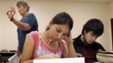 Students at the University of Texas-Southmost College work on a writing assignment in an English as a Second Language class in 2006