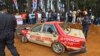 People gather around a car that crashed into the spectators during the Fox Hill Supercross, a motor racing event organized by Sri Lanka's army, in Diyatalawa, Sri Lanka, April 21, 2024. 