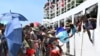 Voters board the already overcrowded Fair Glory ferry in Honiara, Solomon Islands, April 13, 2024, heading to Malaita Island to vote in a national election. The country in which China has gained most influence in the South Pacific goes to the polls on Wednesday.