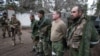 Боевики сепаратистов, взятые в плен военнослужащими ВСУ при попытке атаки на город Счастье в Донецкой области. 24 февраля 2022.