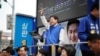 韩国最大在野党共同民主党（DP）领袖李在明2024年4月8日出席一场竞选活动。（路透社）