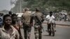 FILE—French army military instructors walk in Tanguietan, northern Benin, March 28, 2022. Benin has been a site of violence linked to al-Qaida and the Islamic State group, which has wracked much of West Africa's Sahel region for more than nine years.