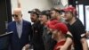 US President Joe Biden greets employees at a Sheetz gas station in Pittsburgh, Pennsylvania, on April 17, 2024.