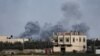 FILE: Israeli strikes seen from Rafah