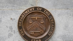 Фрагмент герба Министерства финансов США на здании министерства в Вашингтоне (AP Photo/Patrick Semansky)