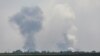 A view shows smoke rising above the area following an alleged explosion in the village of Mayskoye in the Dzhankoi district, Crimea, August 16, 2022. (REUTERS/Stringer)