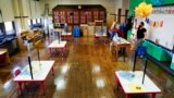 FILE - Desks are spaced apart ahead of planned in-person learning at an elementary school on March 19, 2021, in Philadelphia. (AP Photo/Matt Rourke, File)