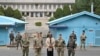 U.S. Ambassador to the United Nations Linda Thomas-Greenfield poses for photos with military officers at Panmunjom in the Demilitarized Zone dividing the two Koreas, Tuesday, April 16, 2024. 