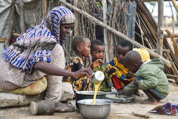 Children having super plus porridge following the resumption of refugee food assistance in in Bokolmayo refugee camp, Somali region of Ethiopia.