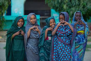 Displaced girls play at a UNICEF-supported learning space in Al Salam, Sudan.