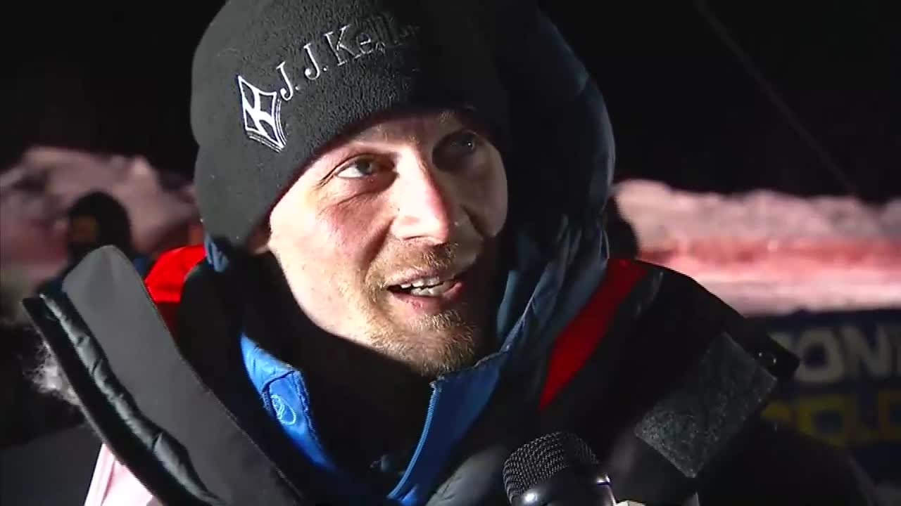 Dallas Seavey, a five-time Iditarod champion, does an interview.