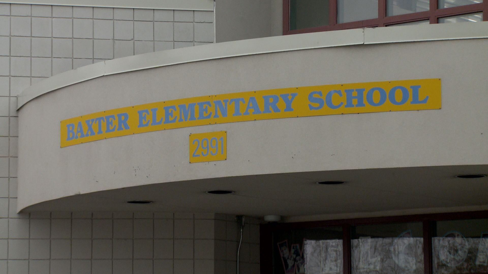 A former staff member at Baxter Elementary is accused of assaulting a student.