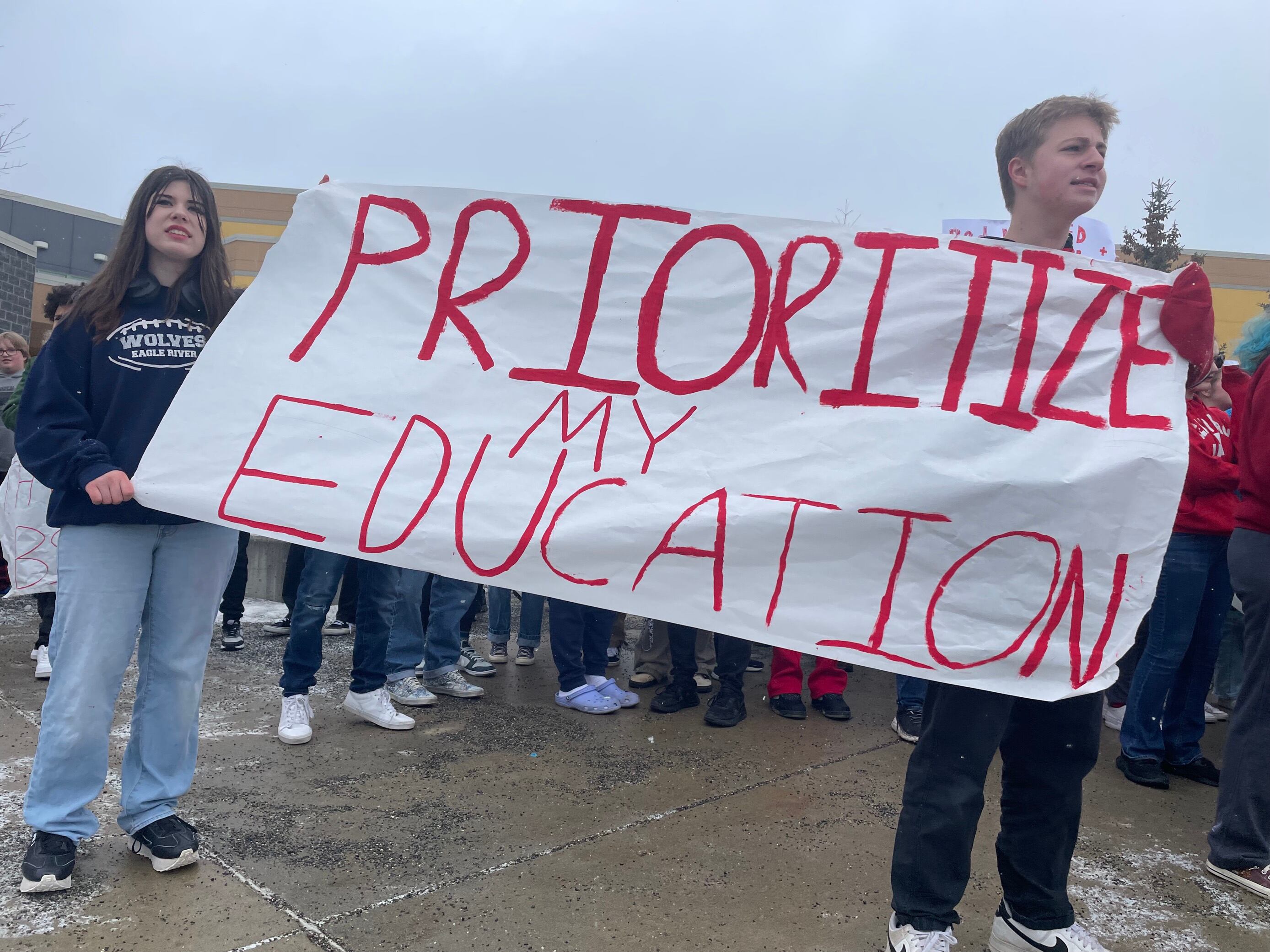 Students at Eagle River High School walk out of class Thursday, April 4, 2024, in a protest...