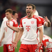 Leon Goretzka of Bayern Munich celebrate with the fans