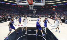 Luka Doncic of the Dallas Mavericks takes a shot against the LA Clippers