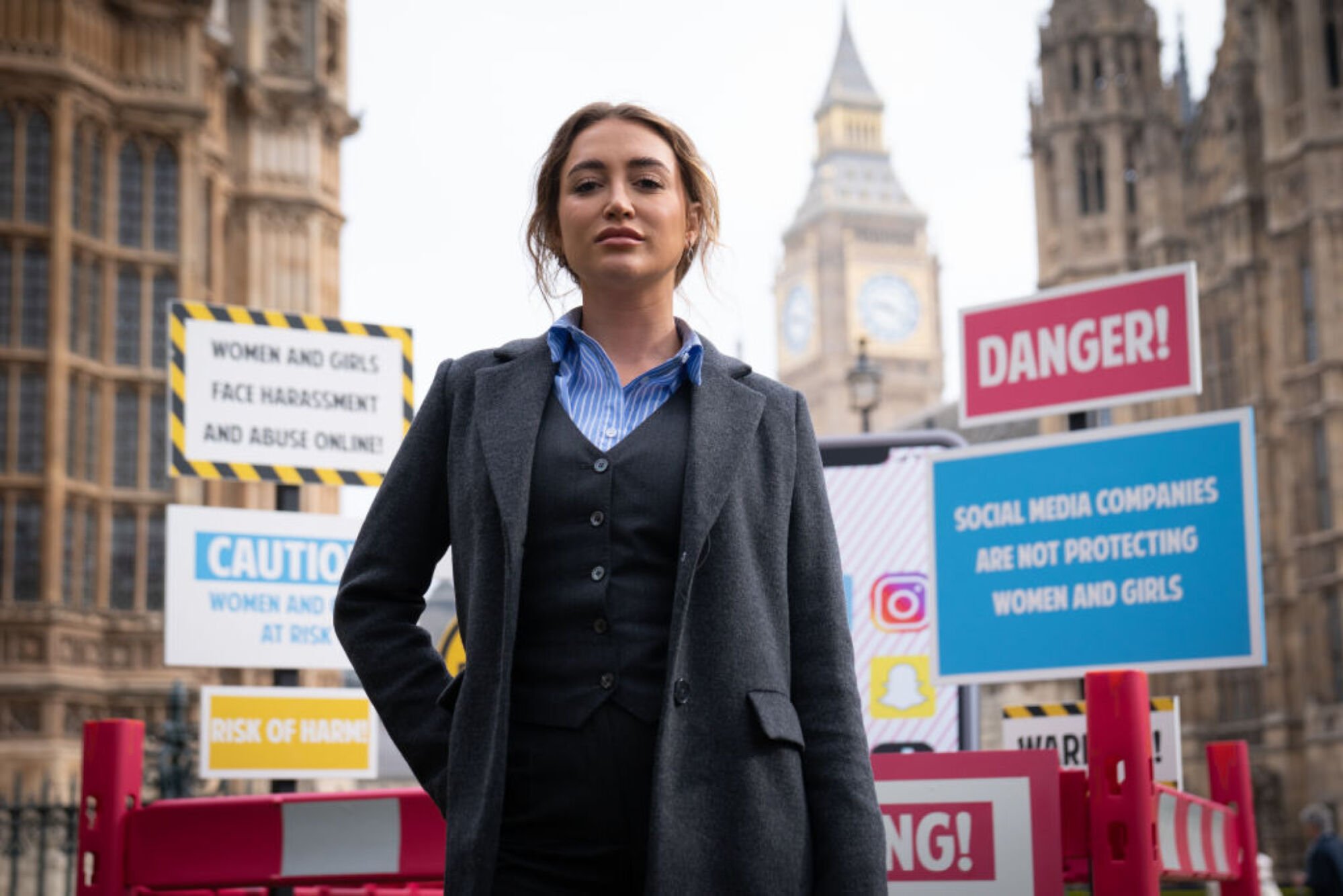 Georgia Harrison, who was a victim of revenge porn, at a demonstration organised by Refuge outside the Houses of Parliament, Westminster, c