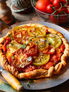 Nothing says summer dining like Marcus Wareing’s puff pastry tart, with layers of roasted tomato sauce, garlic and tapenade.