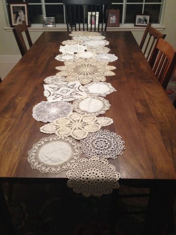 Dining Room With Rectangular Dining Table And Crochet Table Runner