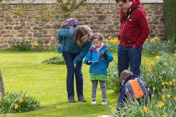 Visitors on an Easter egg trail at Avebury Manor