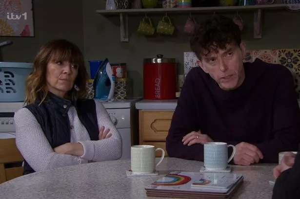 Zoe Henry and Mark Charnock playing Rhona and Marlon in Emmerdale