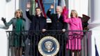 US President Joe Biden and French President Emmanuel Macron wave with their wives Brigitte Macron and US first lady Jill Biden on the Truman Balcony after an official State Arrival Ceremony