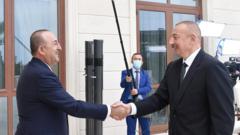 Министр иностранных дел Турции Мевлют Чавушоглу, президент Азербайджана Ильхам Алиев