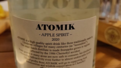 A bottle of Atomik apple spirit with its UK excise stamp