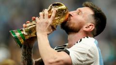 Argentina's Lionel Messi kisses the World Cup trophy