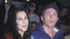 Cher and her son Elijah Blue Allman pictured attending a premiere in 2001 in Westwood, California.