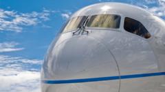 Close up of the nose of a Boeing 787 Dreamliner commercial jet airliner.