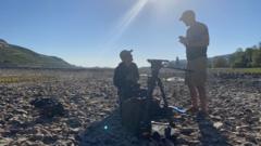 A BBC crew on the Rhine riverbed on Friday