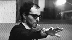French film director Jean-Luc Godard on the set of the film Sympathy for the Devil
