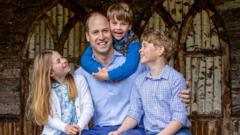 Princ Vilijam sa decom
