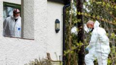 Police officers inspecting Tom Hagen's home near Oslo, 28 Apr 20