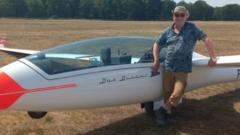 Bert Janssen pictured in front of a glider