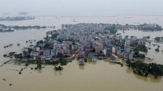 This aerial photo taken on 16 July 2020 shows a flooded area near the Poyang Lake due to torrential rains in Poyang county, Shangrao city, in China's central Jiangxi province