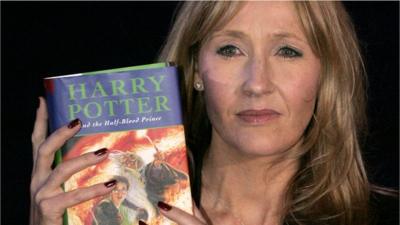 JK Rowling holding Harry Potter and the Half-Blood Prince