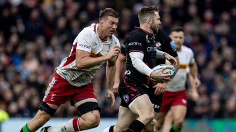 Stephan Lewies chases Elliot Daly during the Premiership Rugby match between Saracens and Harlequins