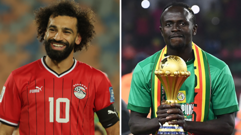 Egypt captain Mohamed Salah is pictured smiling while Senegal forward Sadio Mane holds the Africa Cup of Nations trophy