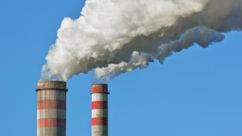 Stock image of a coal power plant smoke stack