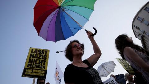 People take part in a rally to protest for the rights of asylum seekers on World Refugee Day in Vienna, Austria June 20, 2018