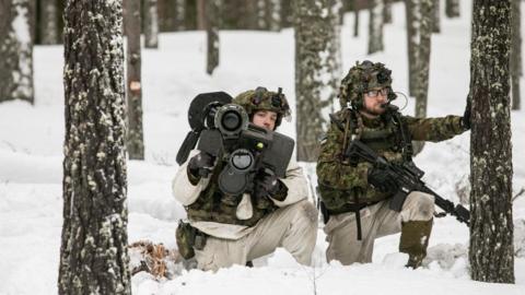 Members of the Estonian army during military training together with UK soldiers