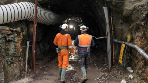 Workers at entrance to the mine at Cononish