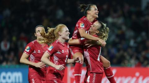 Denmark players celebrate victory