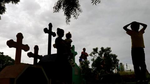 Relatives and friends of 16-year old student Matt Romero --shot dead yesterday during clashes with riot police and paramilitaries within a protest against President Daniel Ortega-- attend his burial,