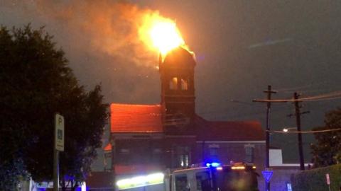 A bell tower on fire in Sydney