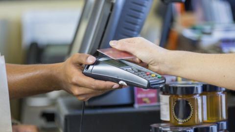 Customer paying with card transaction