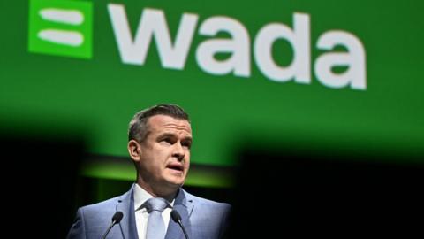 Witold Banka delivers a speech at the WADA symposium in Lausanne