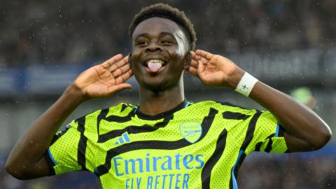 Bukayo Saka celebrates scoring against Brighton