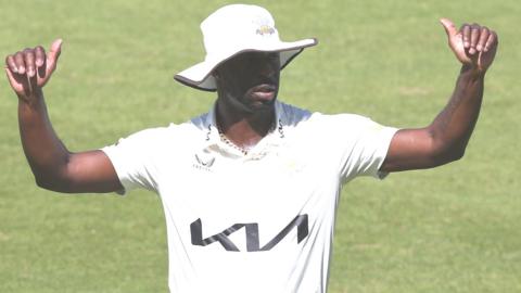Kemar Roach acknowledges the crowd after taking two wickets in two balls at The Oval